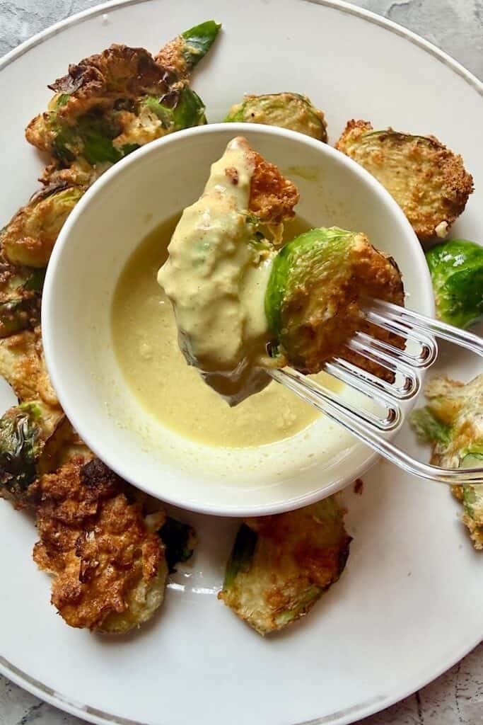 Fried Brussels Sprouts Covered in Pickled mustard sauce